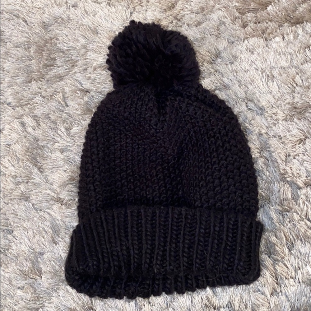 Never worn Black pom Pom beanie